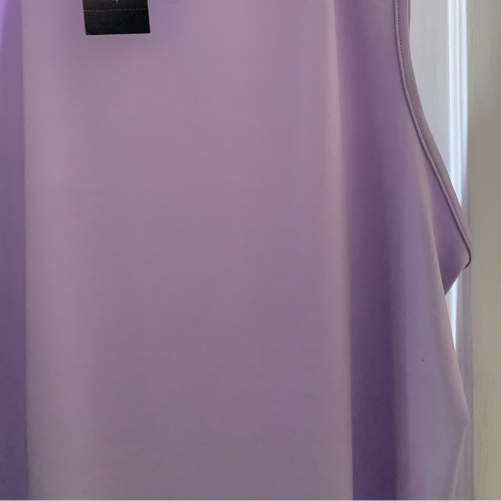 Ashley Stewart’ lilac short sleeve turtle neck size: 18/20. Armpit 22. L is 24